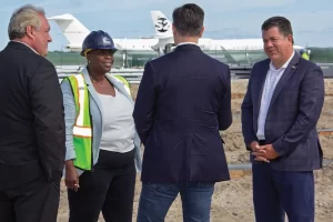 Congressman Nick LaLota (far right) discusses a newbuilding with project stakeholders at Francis S. Gabreski Airport in Westhampton Beach on August 19, 2025.